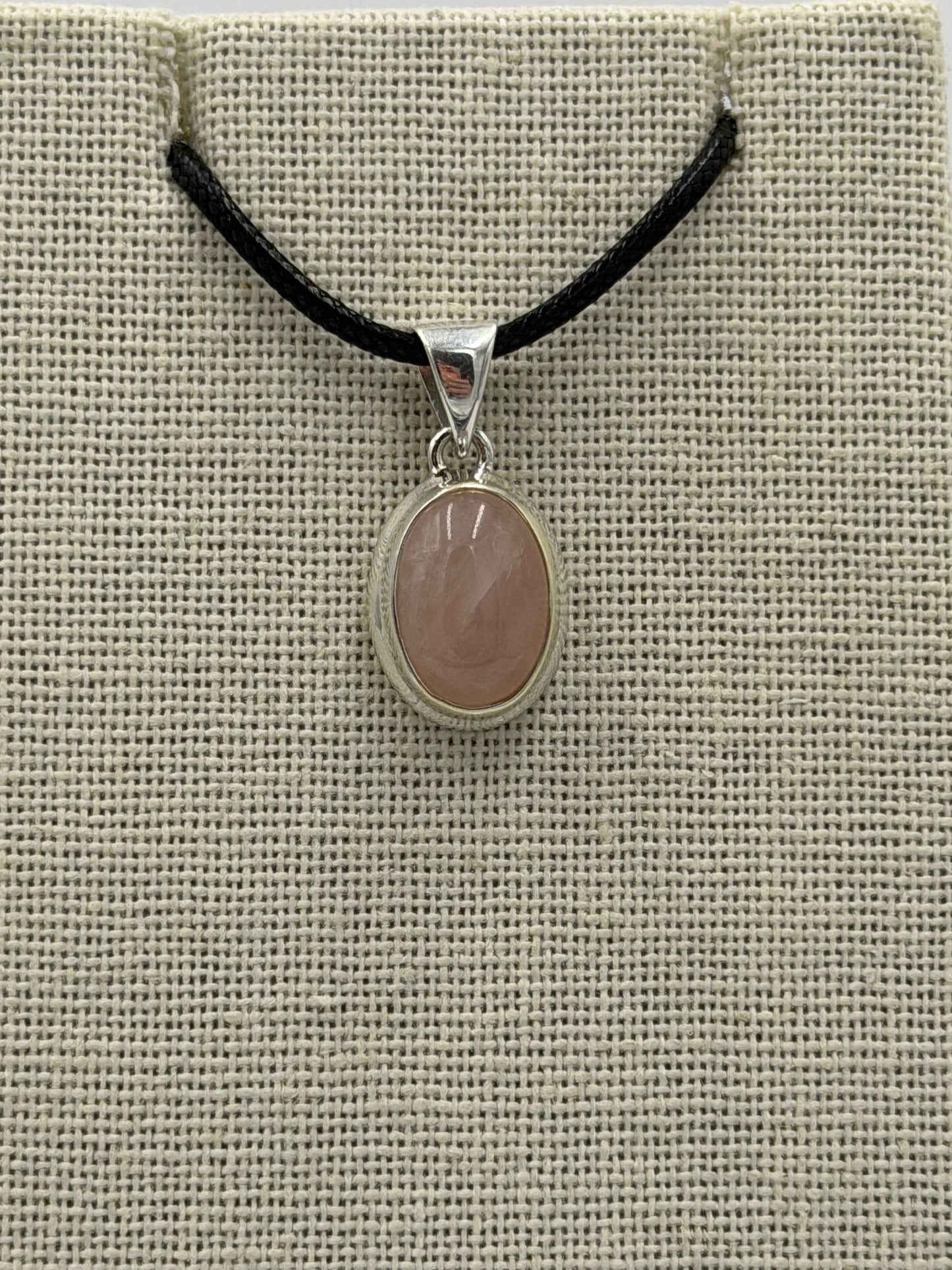 Sterling Silver Bezeled Oval Rose Quartz Pendant