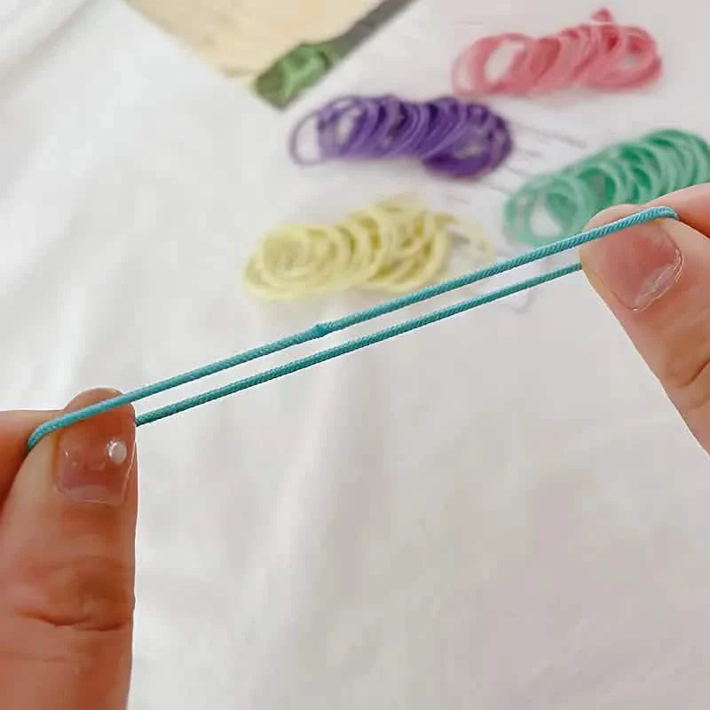 100 pièces : Élastiques à cheveux en cuir haute élasticité, pour queue de cheval - Sans couture