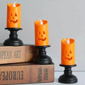 Lot de 12 : bougies chandelier citrouille LED Halloween