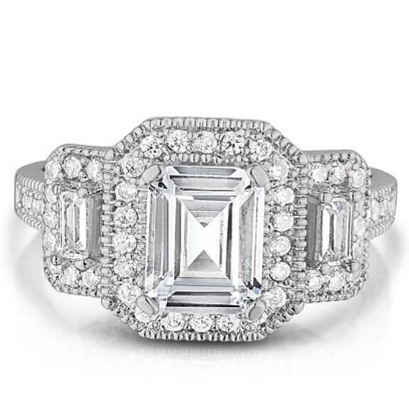 Bague trilogie en or blanc 18 carats avec oxydes de zirconium taille émeraude