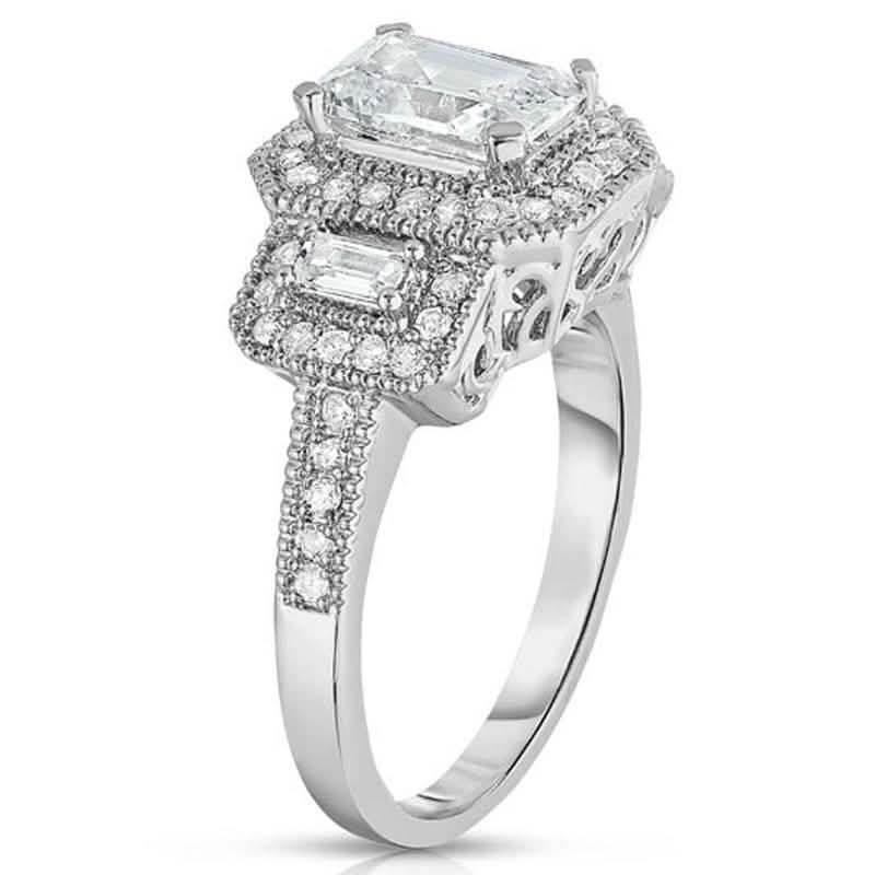Bague trilogie en or blanc 18 carats avec oxydes de zirconium taille émeraude