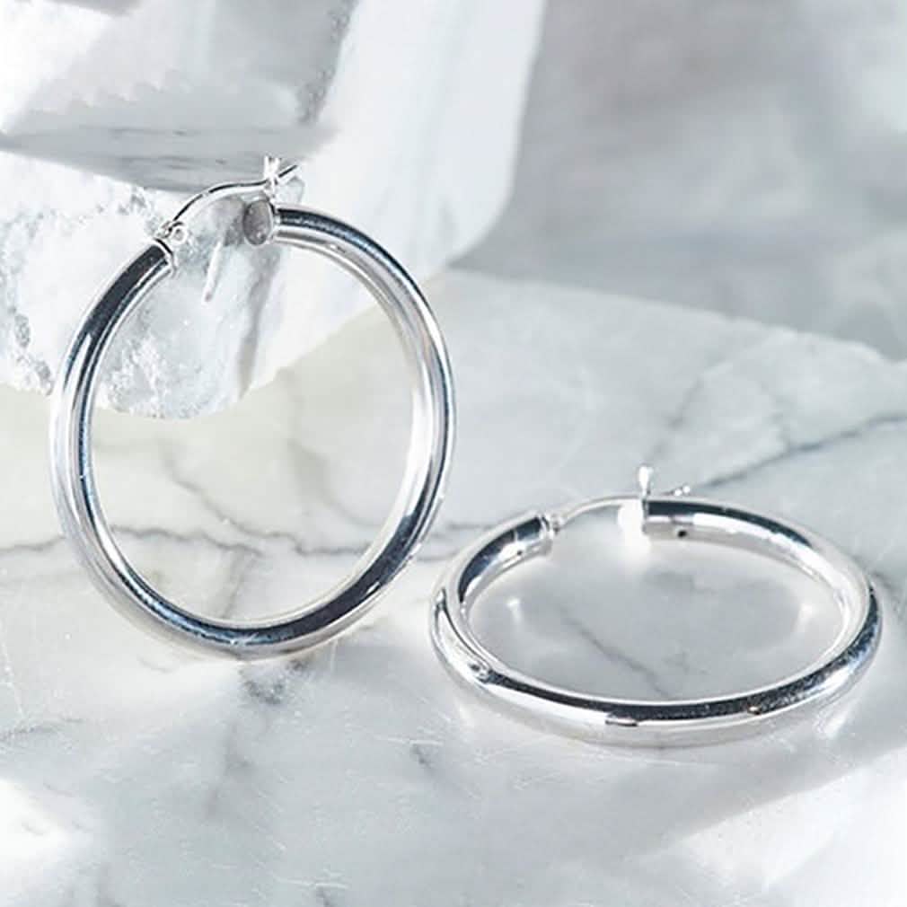 Créoles classiques de 25 mm en argent massif avec fermoir français