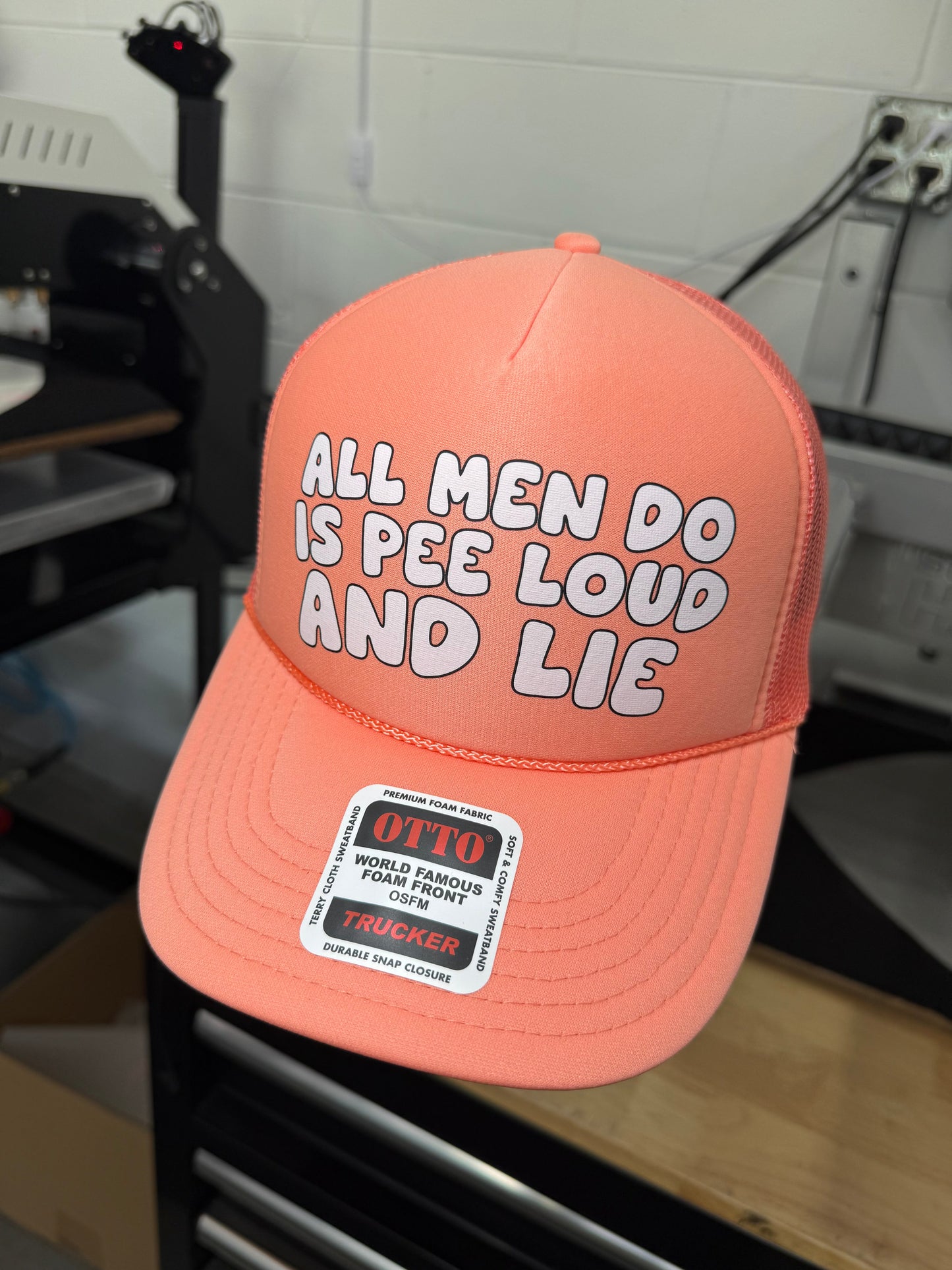 All Men Do Is Pee Loud And Lie Trucker Hat