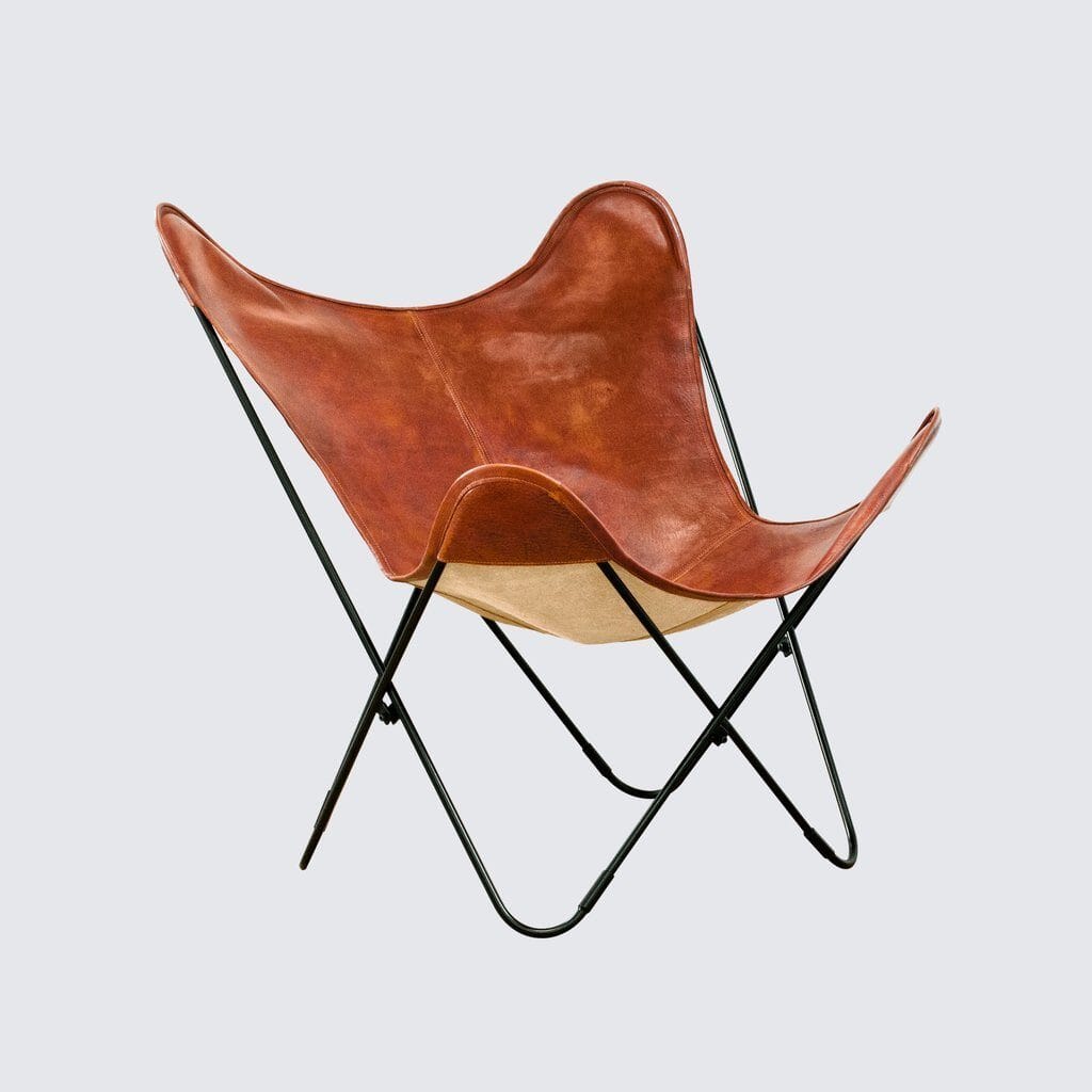 Le fauteuil papillon vintage Cognac