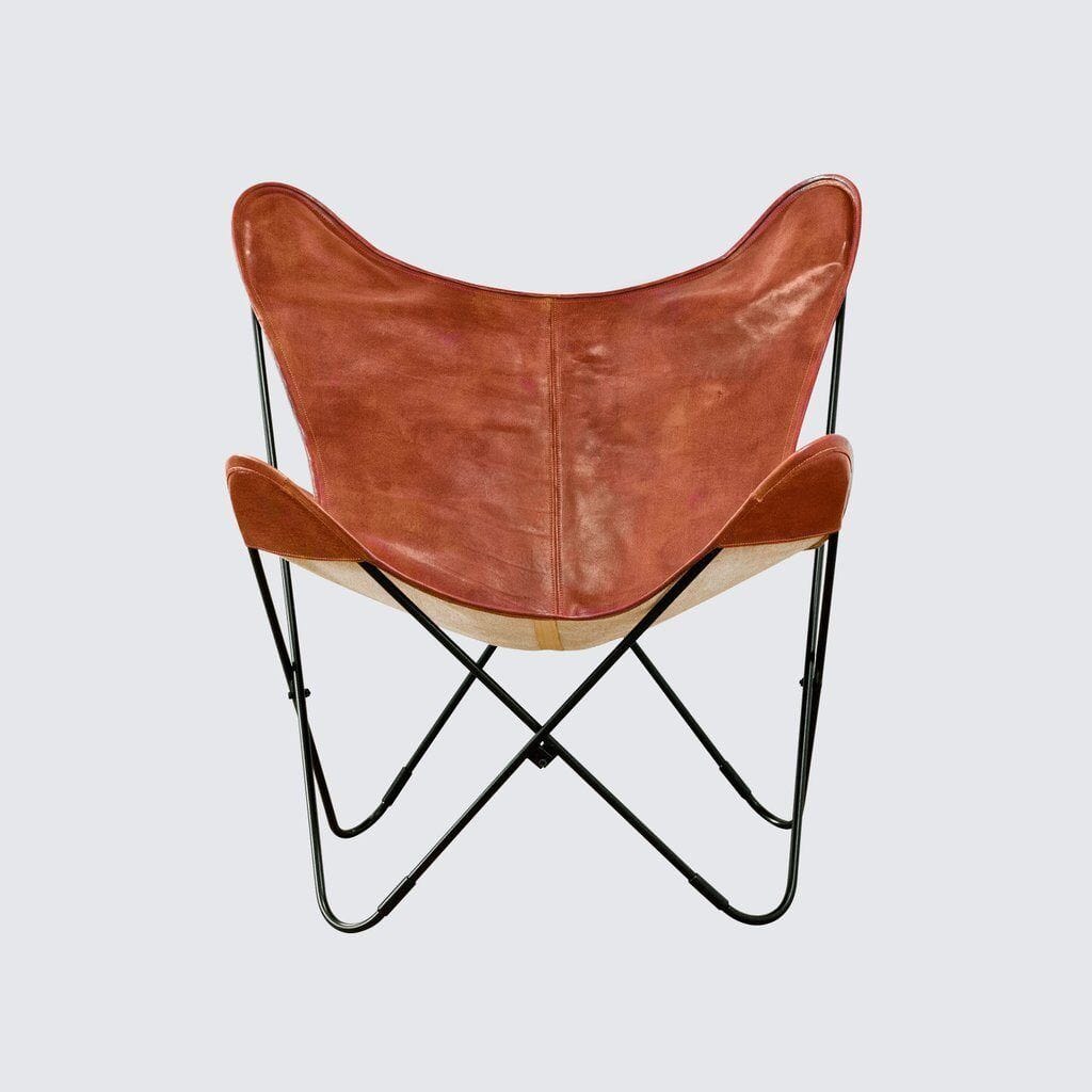 Le fauteuil papillon vintage Cognac