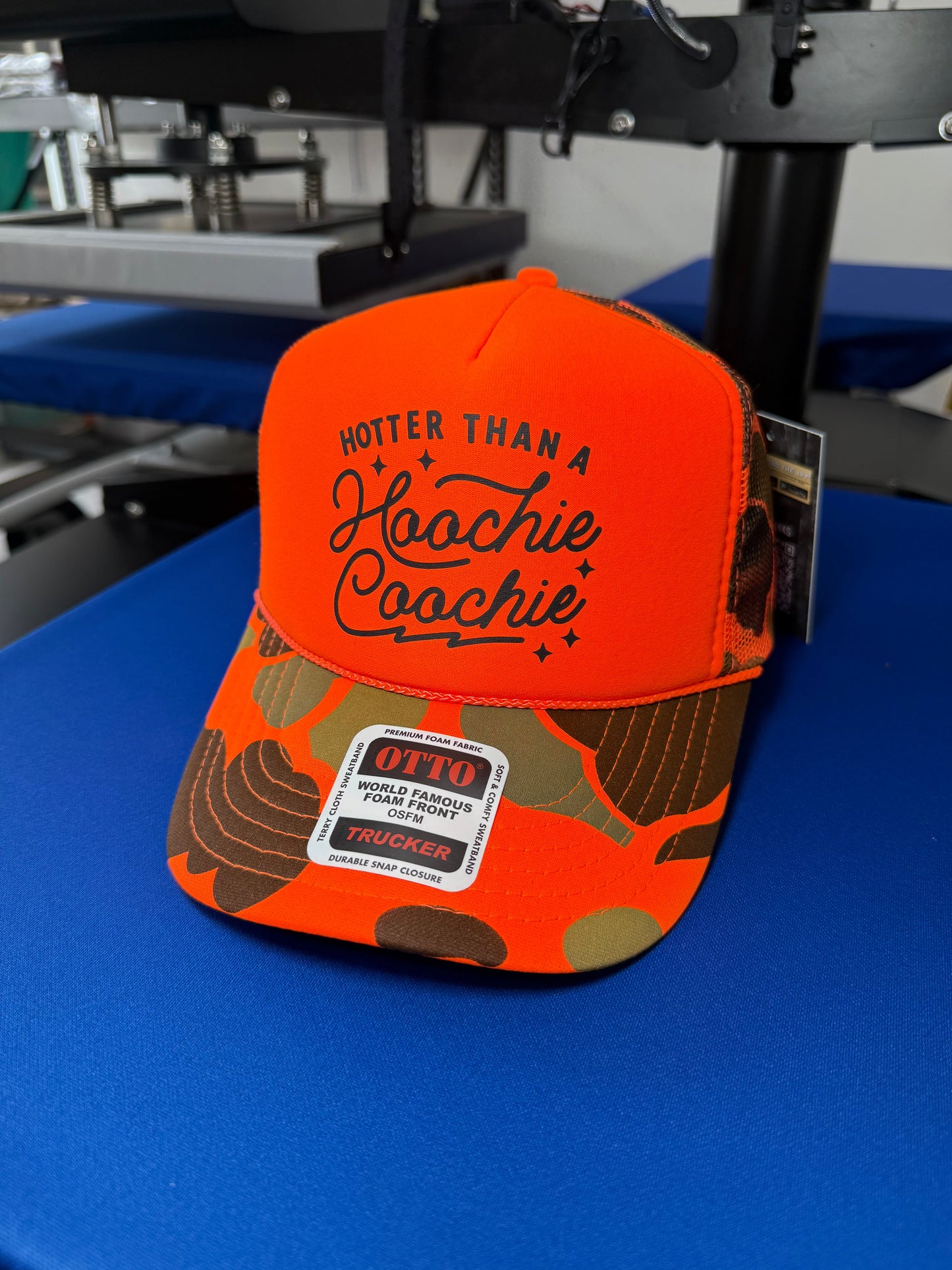 Hotter Than A Hoochie Coochie Trucker Hat