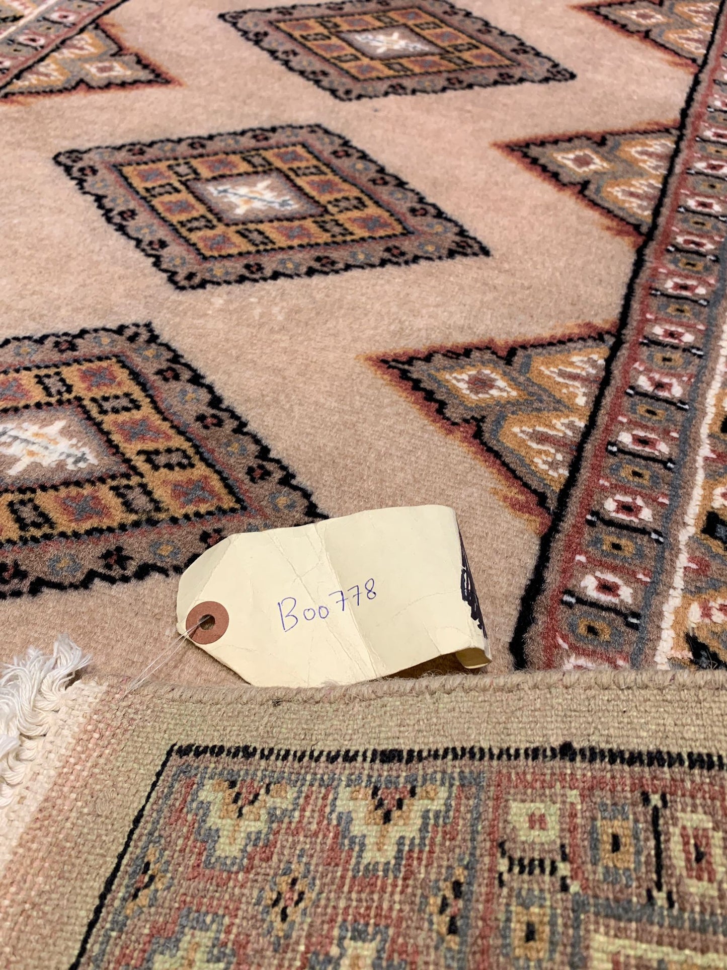 Hand-Knotted Pakistani Wool Rug, Tribal/Floral Design, size 2' 6" x 4' 1"