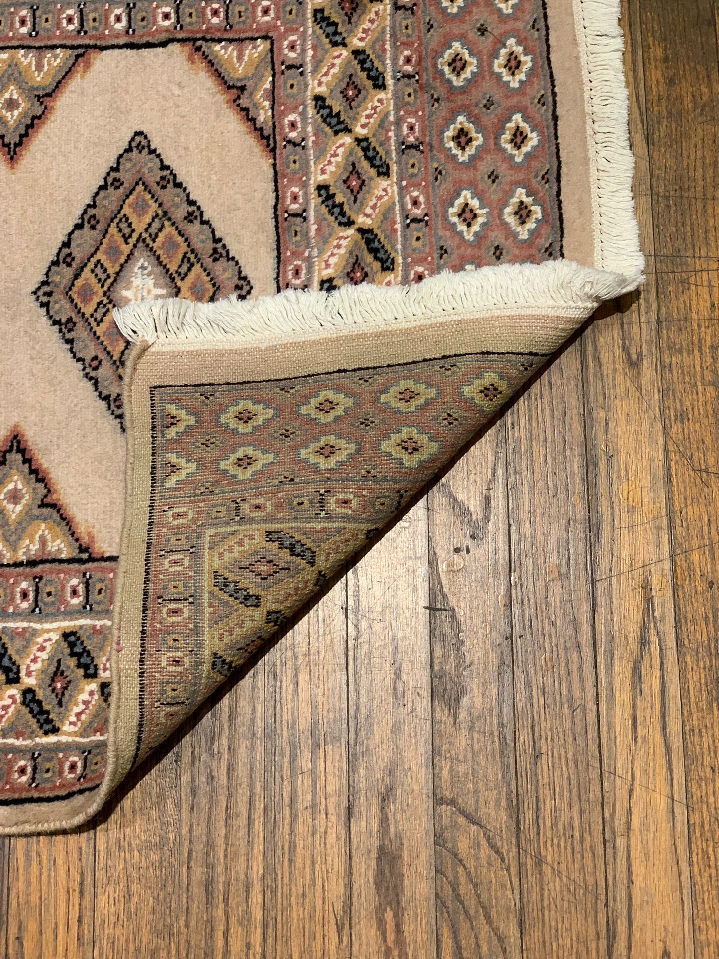 Hand-Knotted Pakistani Wool Rug, Tribal/Floral Design, size 2' 6" x 4' 1"