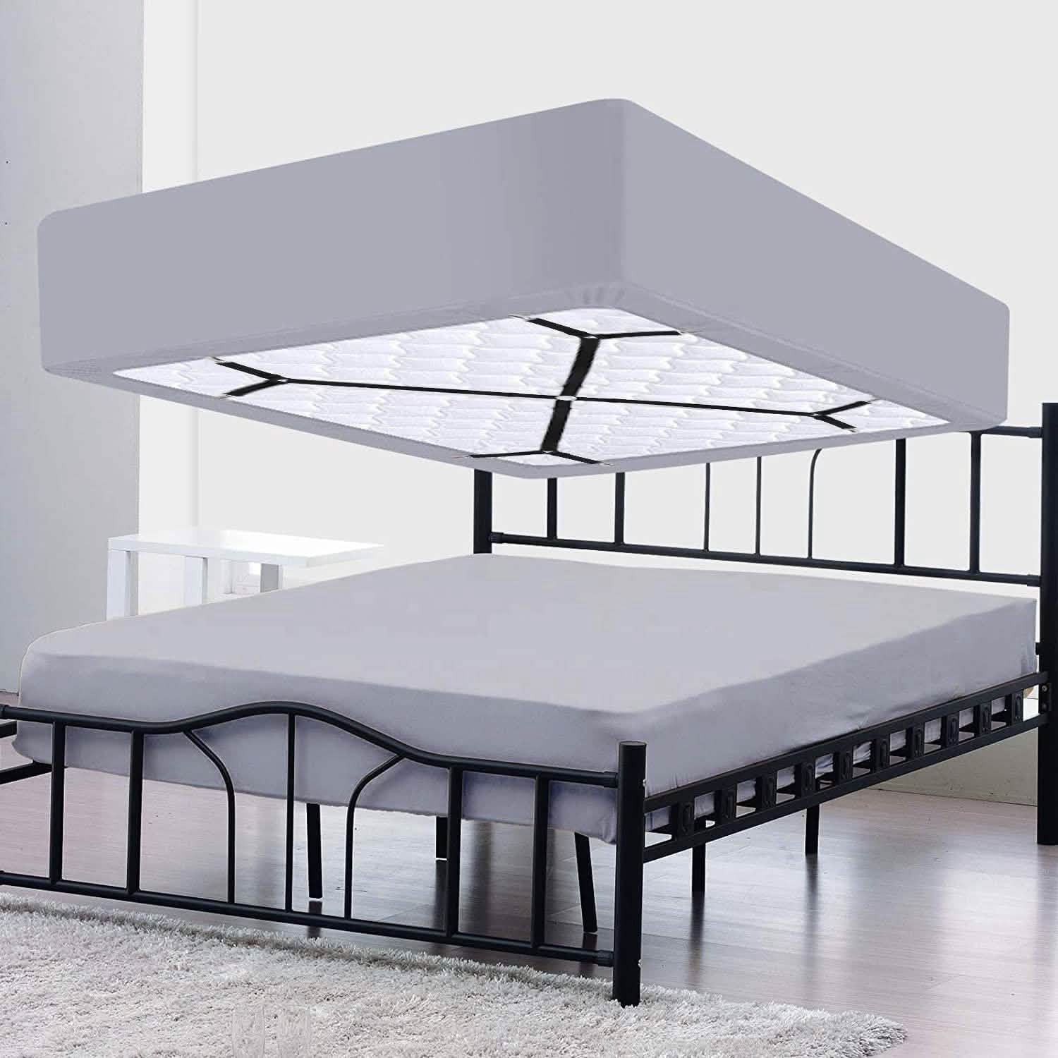 Attaches-draps élastiques réglables en croix pour le maintien des draps