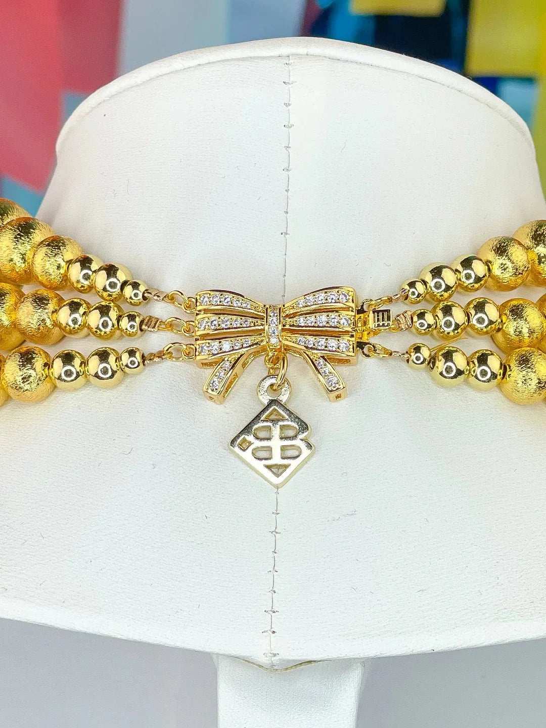 BRIANNA CANNON - 
3 Strand Gold Beaded Brianna Necklace