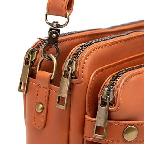 Sac bandoulière en cuir et pochette