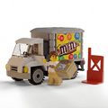 Camion de livraison de bonbons aux cacahuètes avec figurine