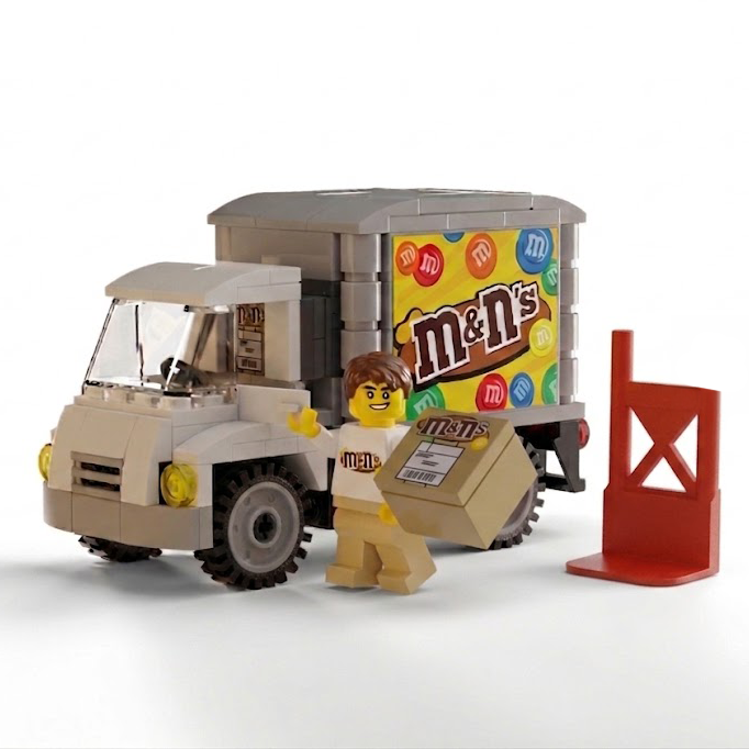 Camion de livraison de bonbons aux cacahuètes avec figurine