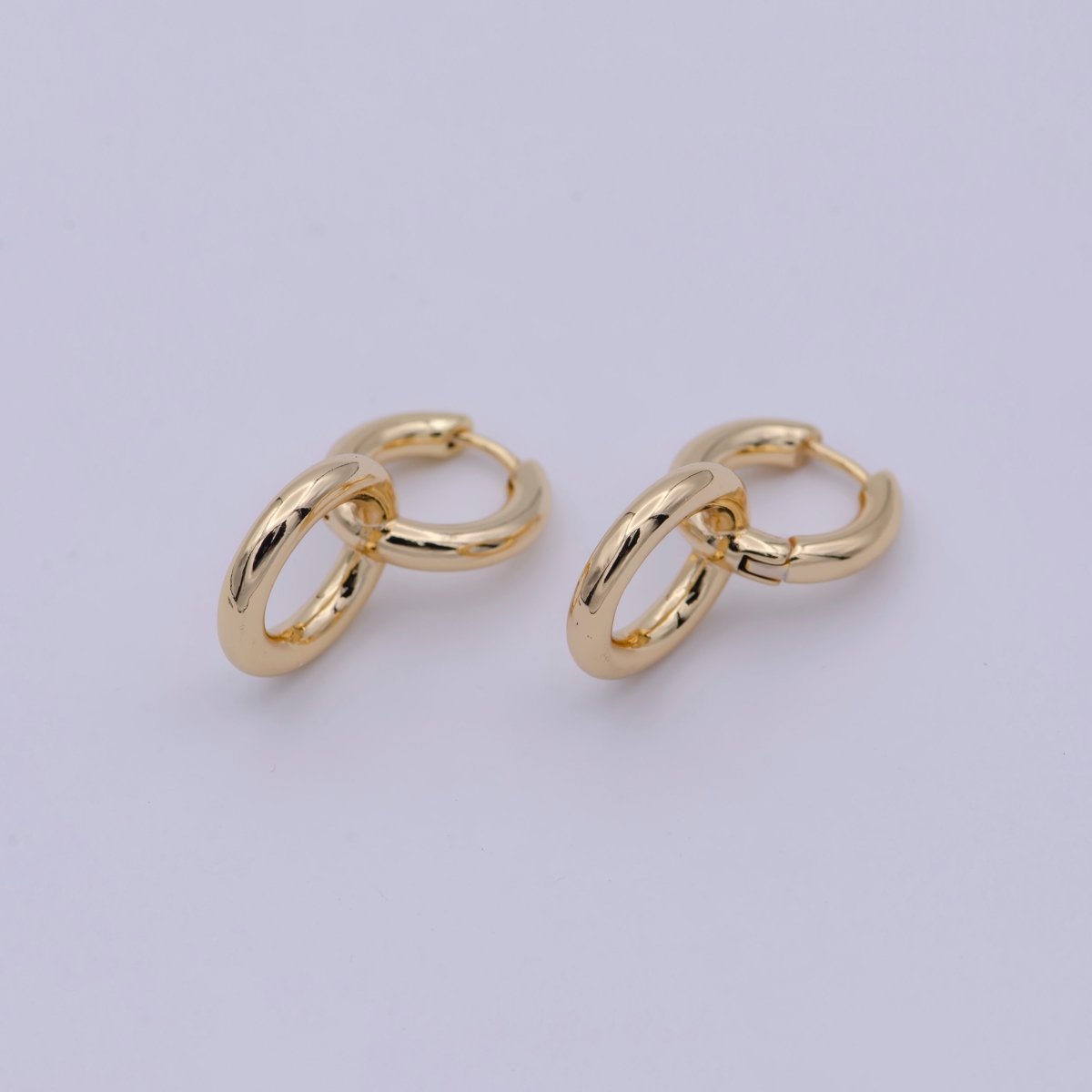 Dainty Intertwined Huggie Earrings with Round Dangle Charm Drop | AD-085