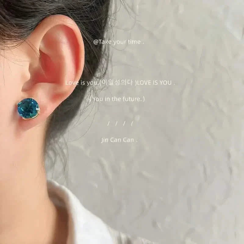 Boucles d'oreilles en cuivre de style européen et américain avec zircon bleu