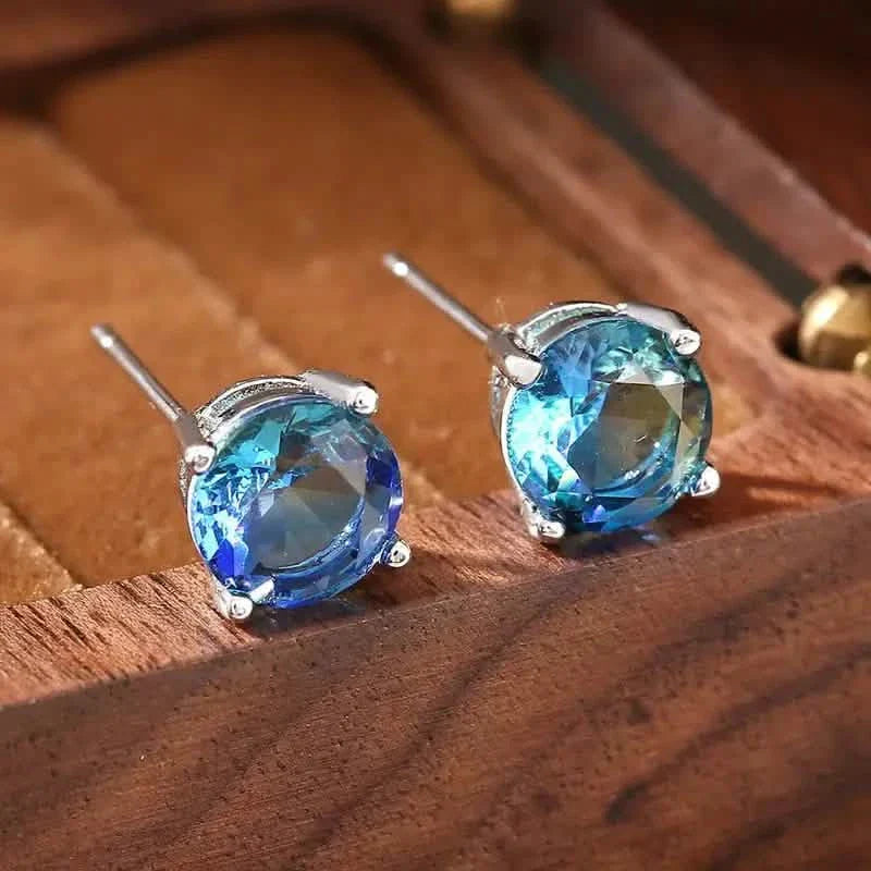Boucles d'oreilles en cuivre de style européen et américain avec zircon bleu