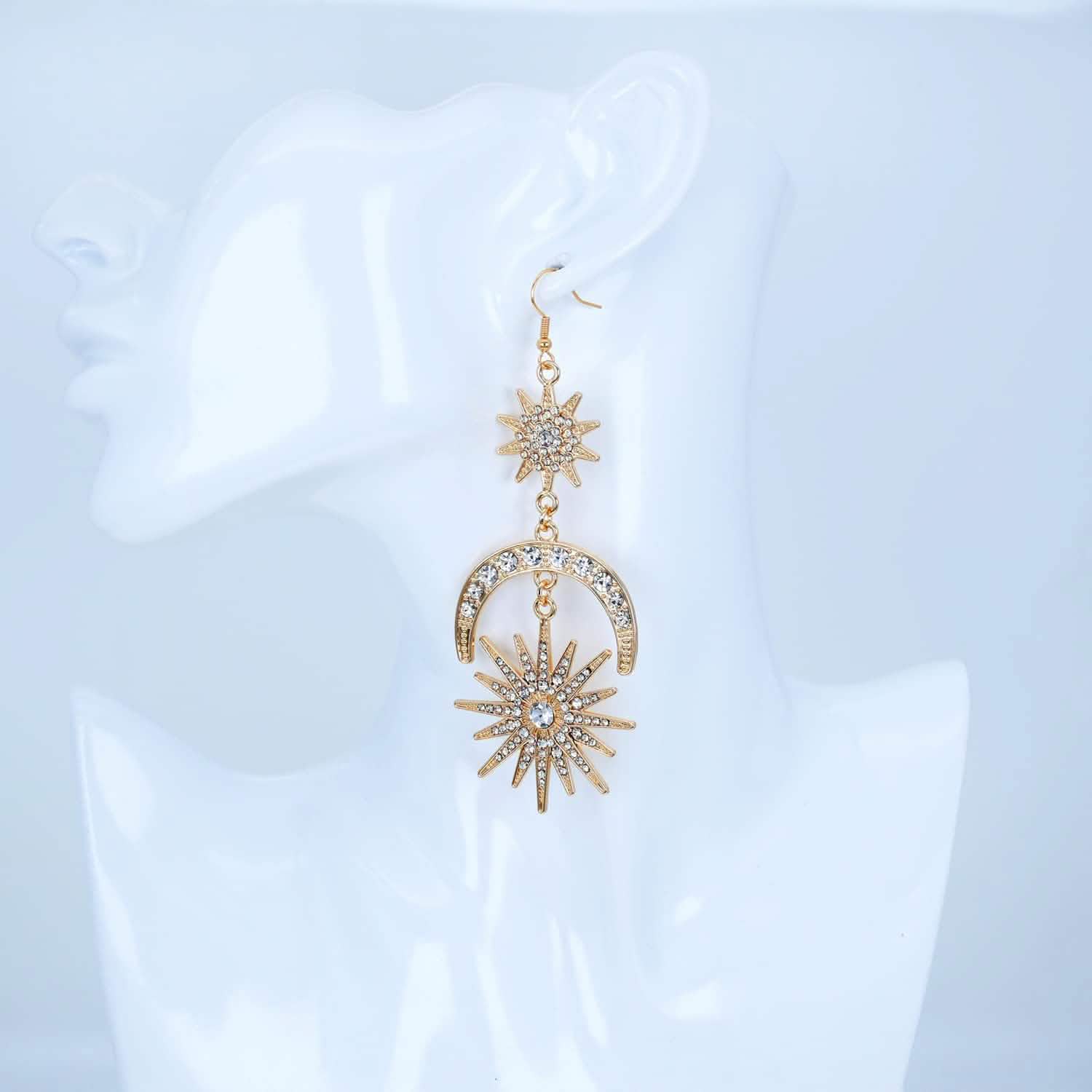 Boucles d'oreilles pendantes étoiles, lune et soleil de luxe exagéré