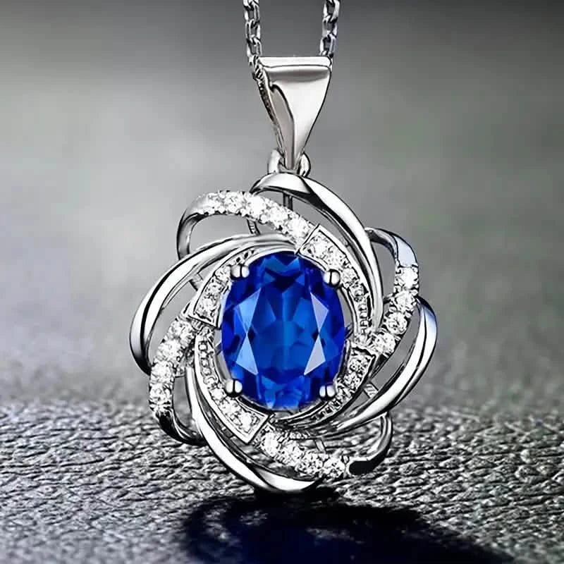 Collier pendentif fleur spirale élégant en fausse pierre précieuse en verre