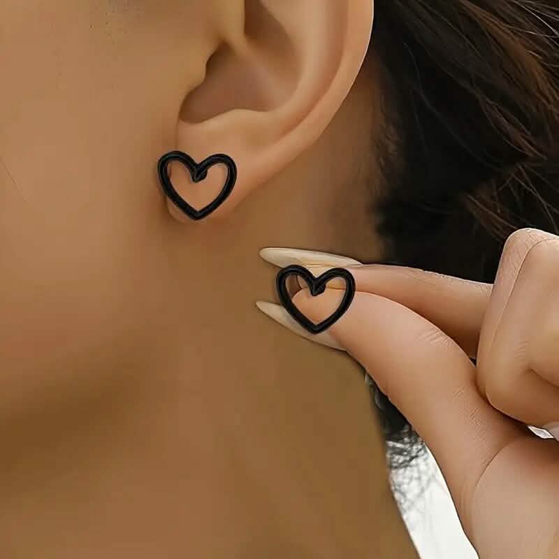 Boucles d'oreilles clous motif cœur creux brillant
