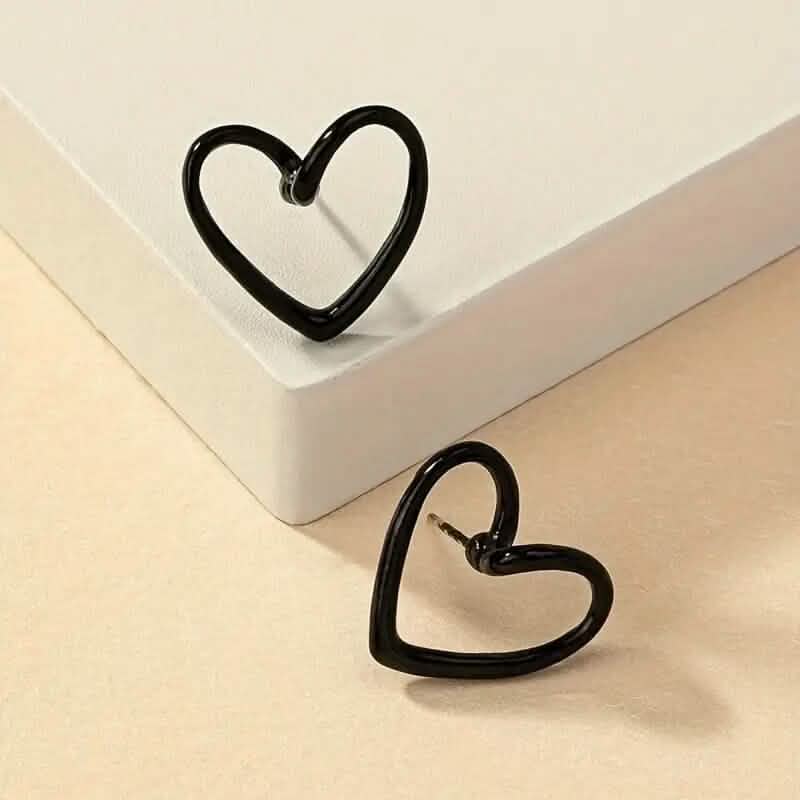 Boucles d'oreilles clous motif cœur creux brillant