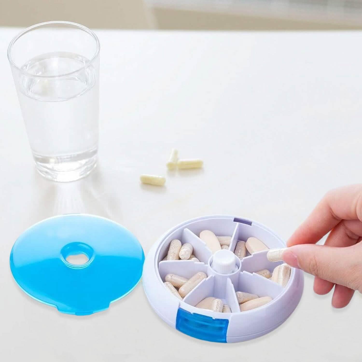 Organisateur de médicaments quotidien portable à bouton-poussoir rotatif et rond, pour une prise par jour
